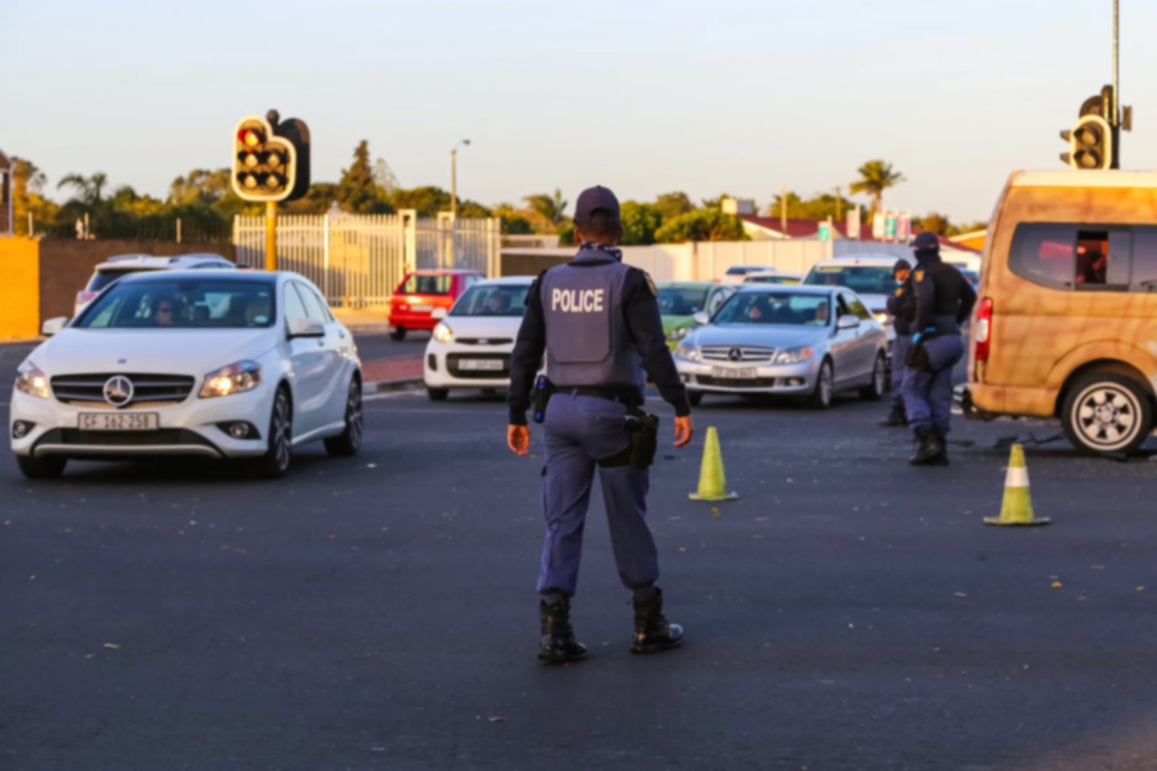 Traffic police directing cars after an incident