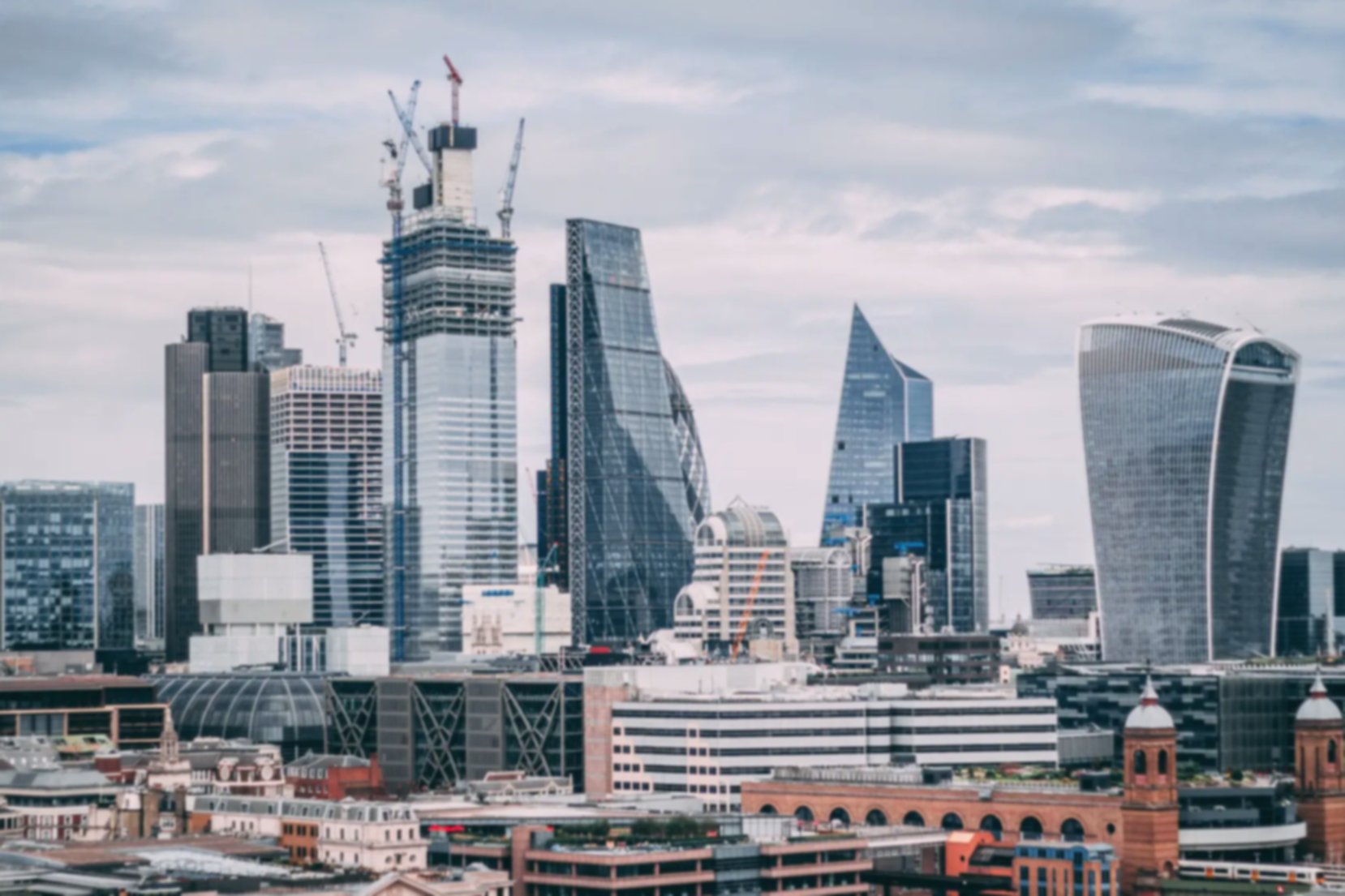 The Central London skyline where skyscrapers belonging to major corporations can be seen