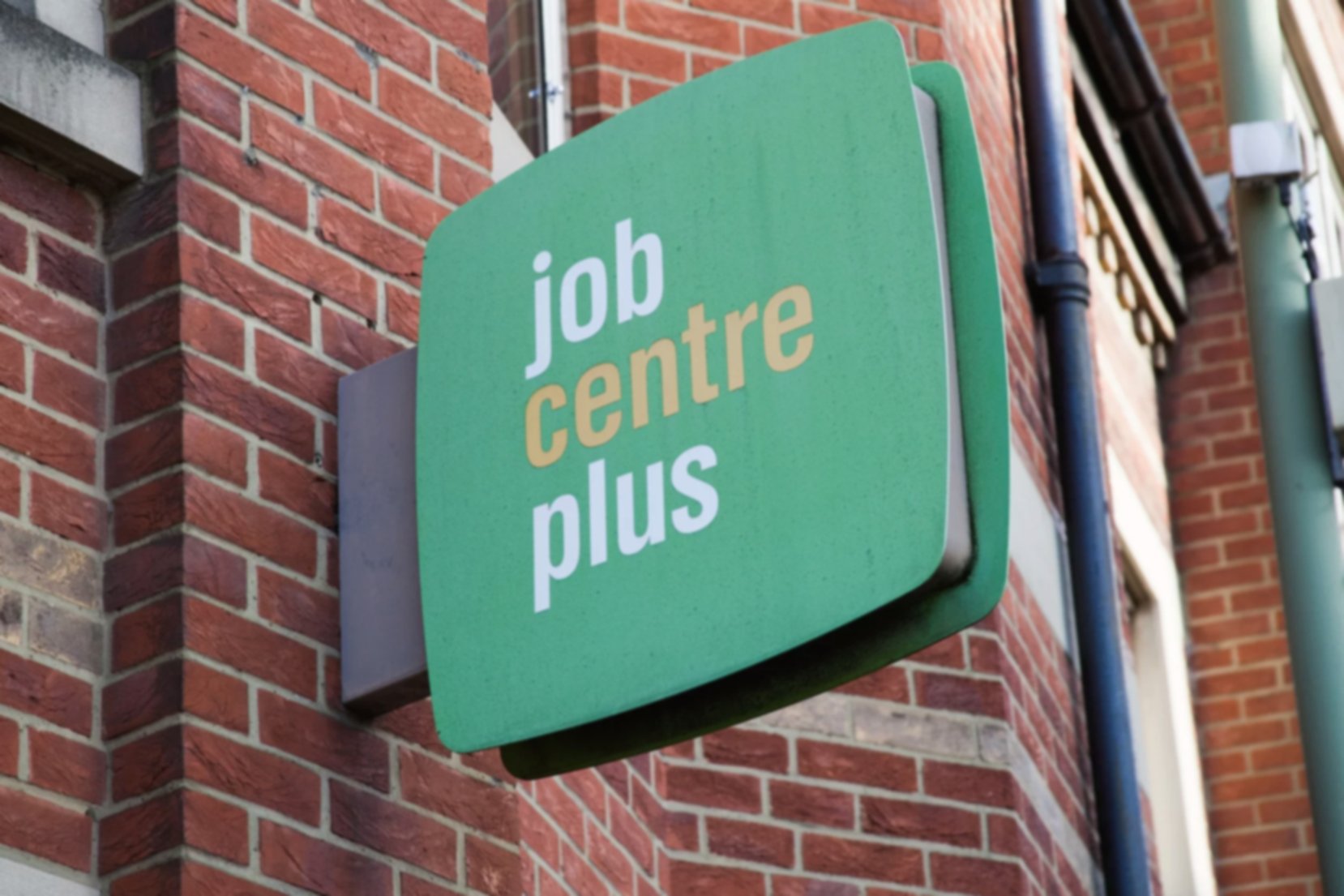 Green sign at a Job Centre Plus location