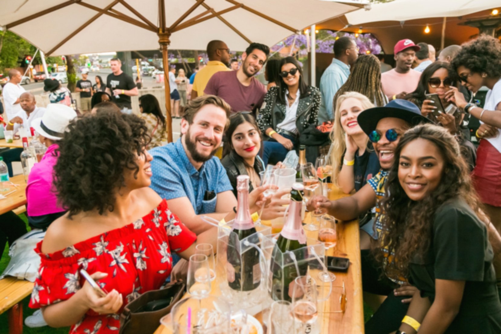 Friends drinking wine together in Johannesburg, South Africa.